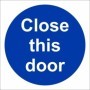 Close This Door mandatory sign with white text on a blue circular background