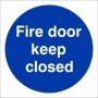 Fire Door Keep Closed mandatory door sign with white text on a blue circular background