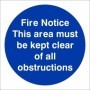Fire Notice This Area Must Be Kept Clear Of All Obstructions mandatory sign with white text on a blue circular background