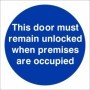 This Door Must Remain Unlocked When Premises Are Occupied mandatory sign with white text on a blue circular background